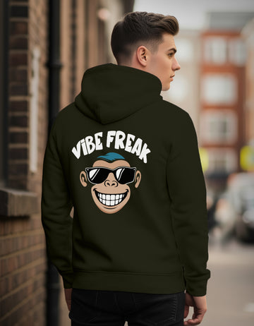 Person wearing a Dumkee black regular fit hoodie with 'Vibe Freak' design on the back.