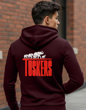 Person wearing a Dumkee maroon hoodie with 'Tuskers' design on the back.