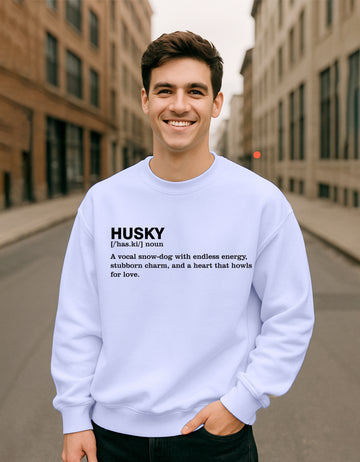 Man wearing a Dumkee Oversize light blue sweatshirt with text on a city street