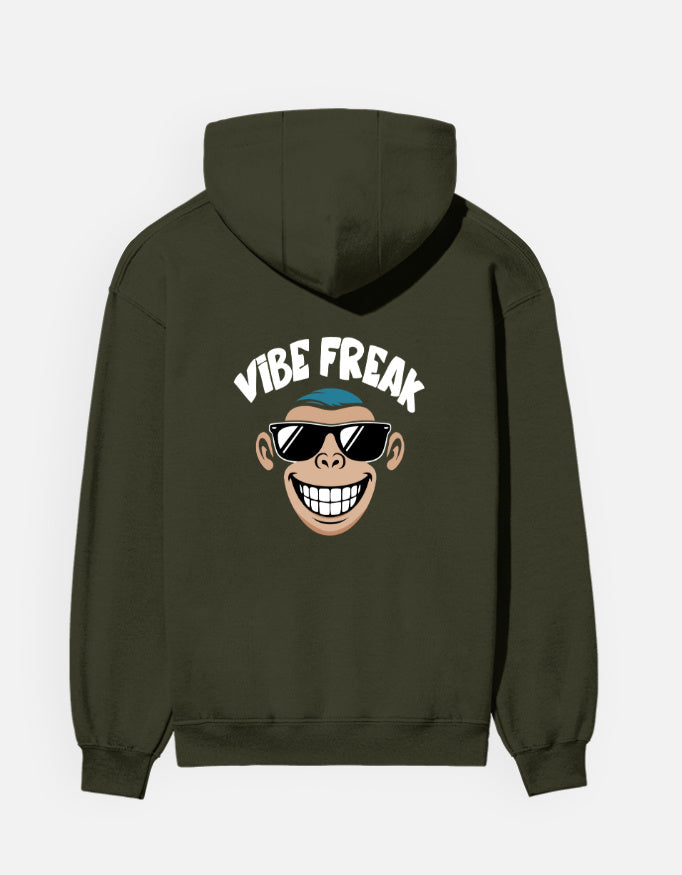 Person wearing a Dumkee black regular fit hoodie with 'Vibe Freak' design on the back.