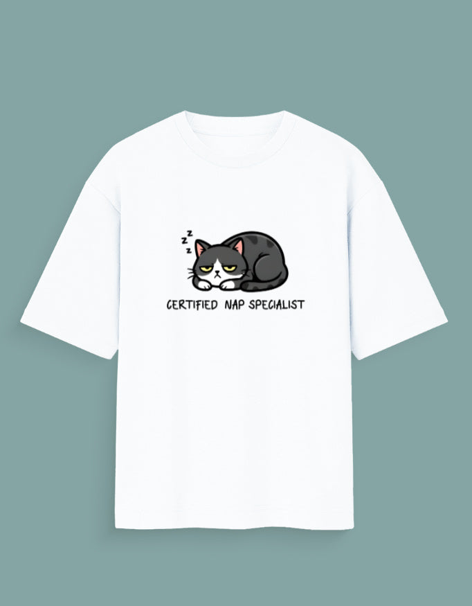 Woman wearing a white t-shirt with a cat graphic and text