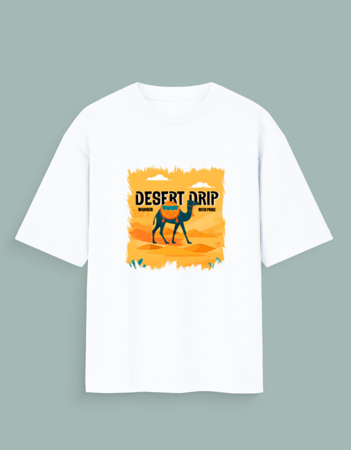 Person wearing a Dumkee Oversize white t-shirt with a 'Desert Drip' graphic on a subway train.