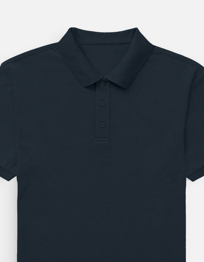 Man wearing a Dumkee navy blue polo shirt