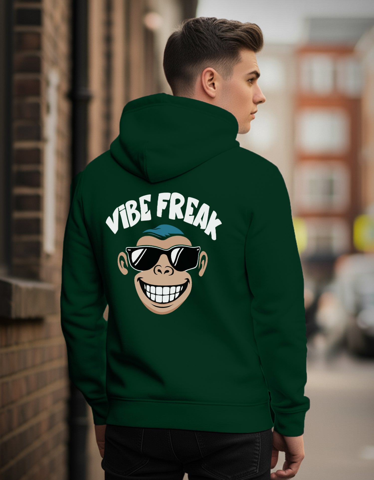 Person wearing a Dumkee green regular fit hoodie with 'Vibe Freak' design on the back.