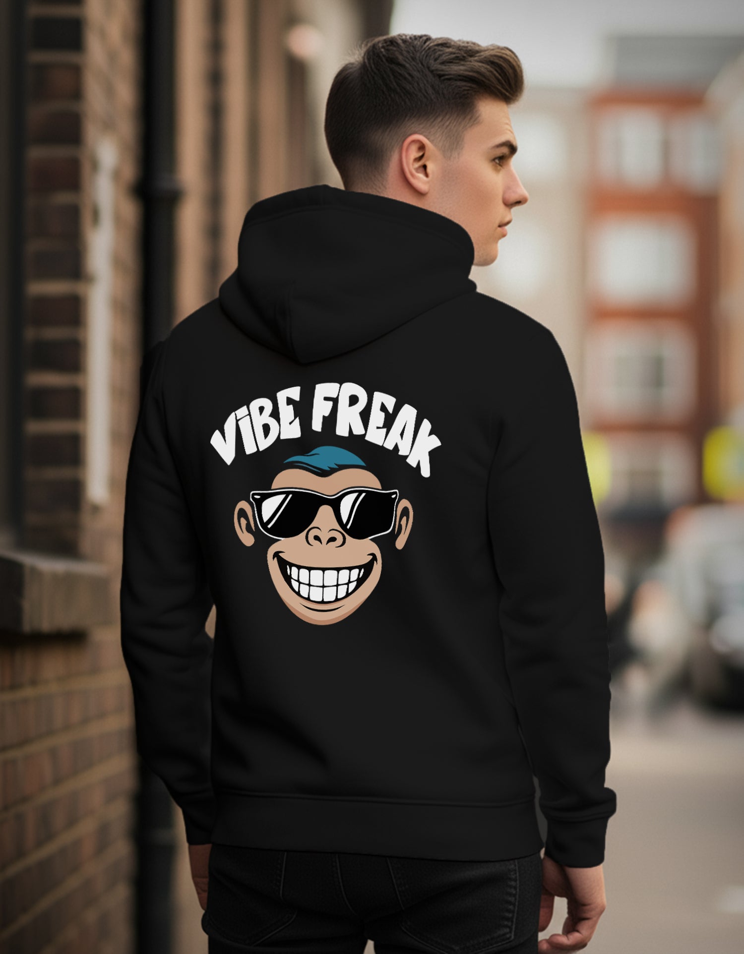 Person wearing a Dumkee regular fit black hoodie with 'Vibe Freak' design on the back.