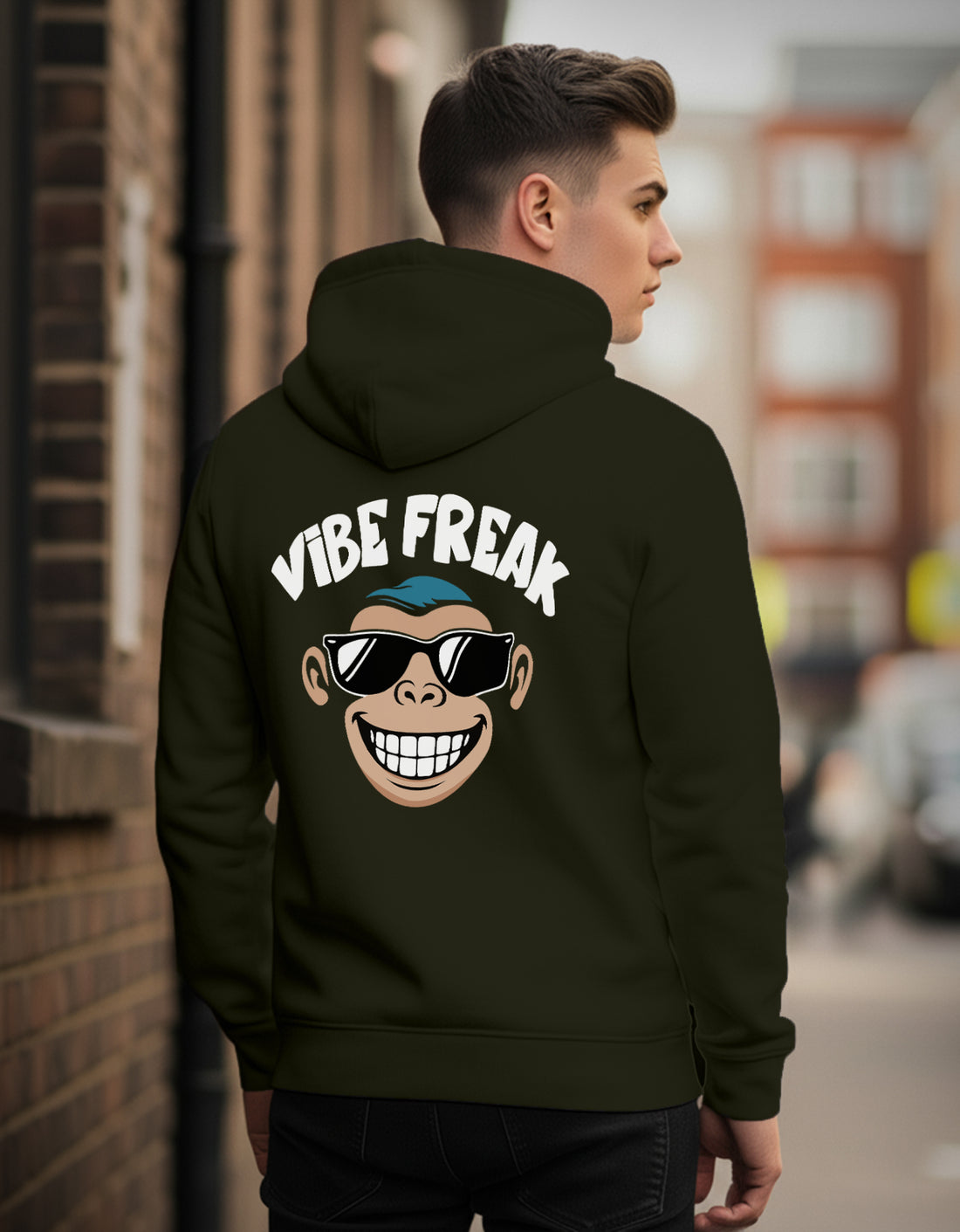 Person wearing a Dumkee black regular fit hoodie with 'Vibe Freak' design on the back.