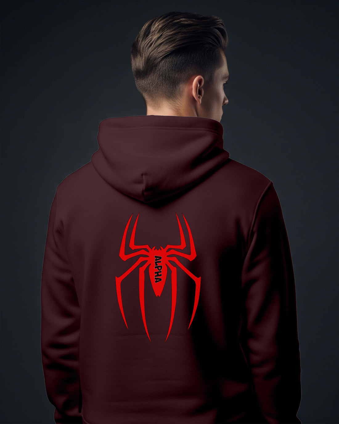 Person wearing a Dumkee maroon hoodie with a red spider logo on the back.